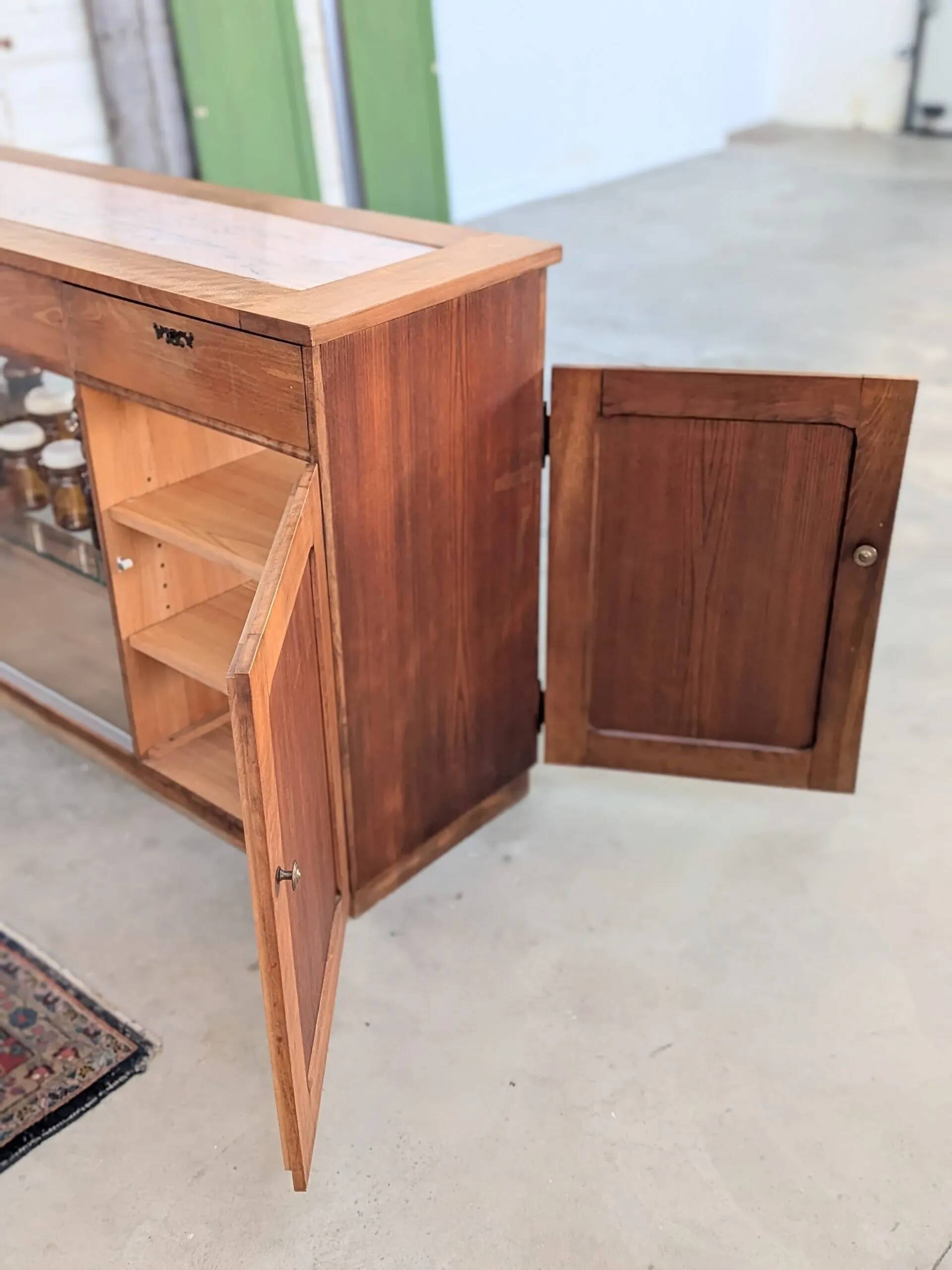 Double-sided counter in wood and pink marble (233 cm)