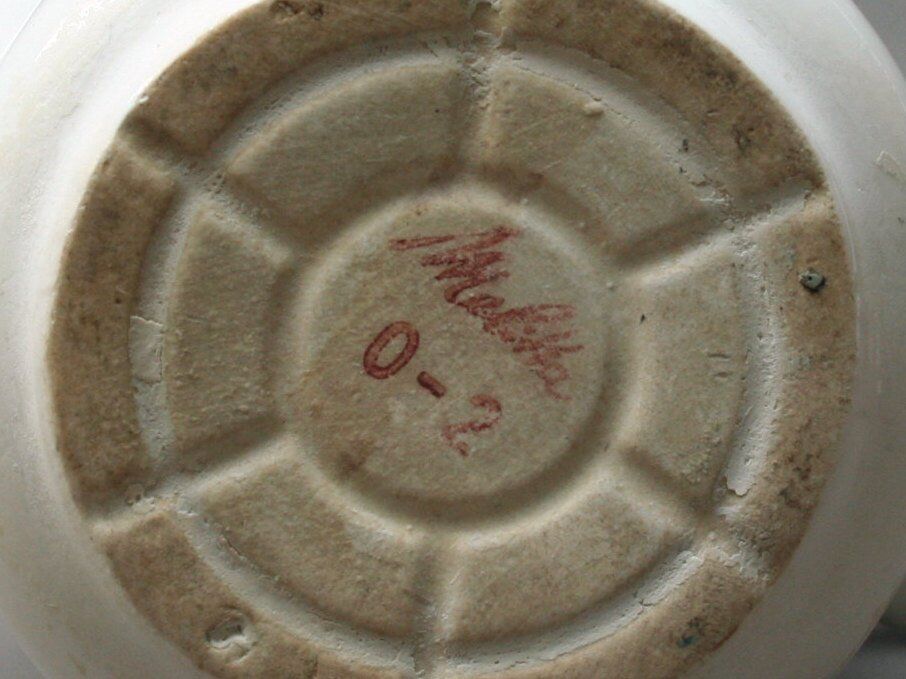 White ceramic coffeemaker and melitta filter, 60 years