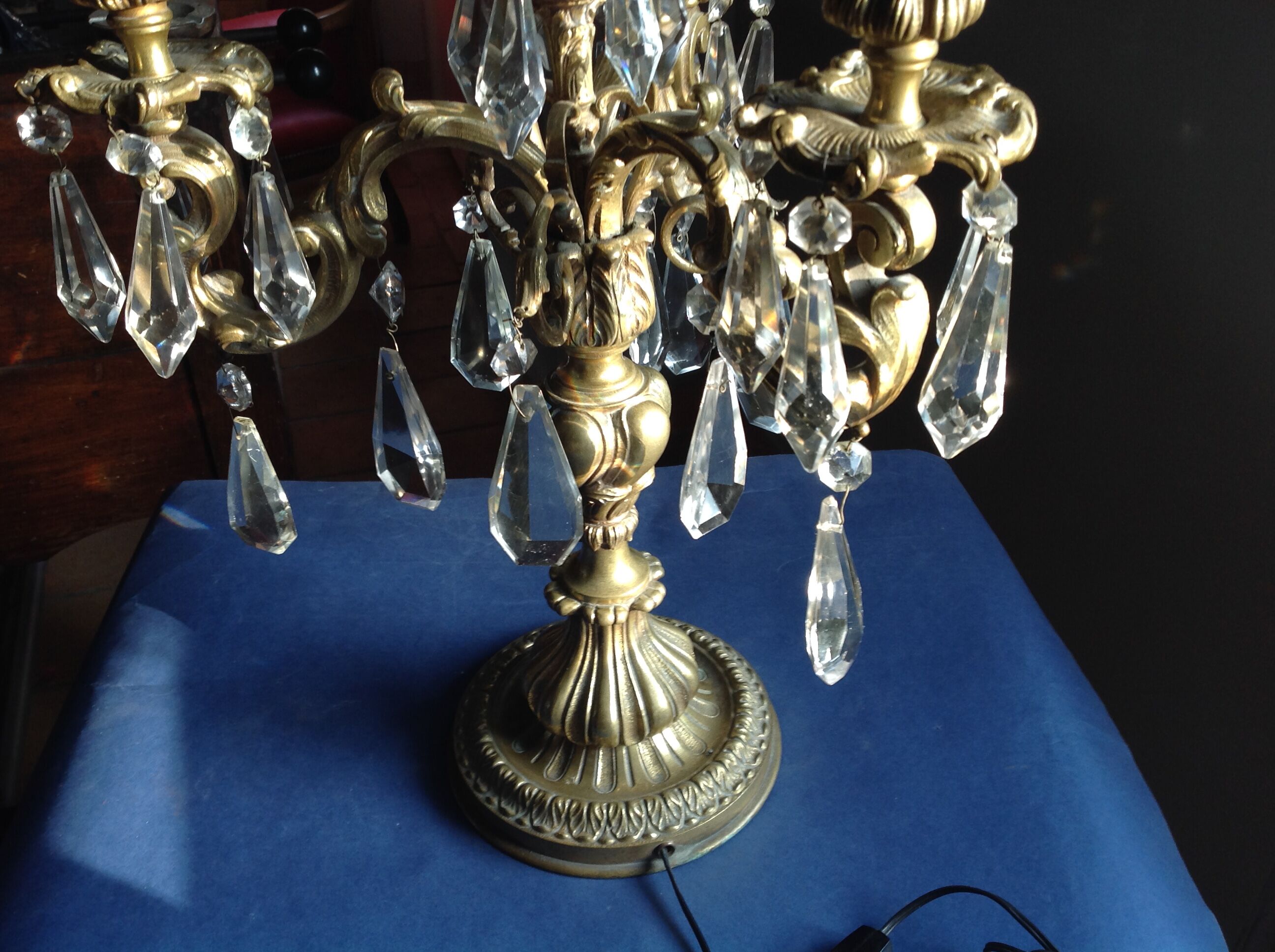 Girandolle in bronze and stamps, early 20th