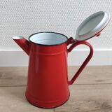 Vintage red coffee maker in enamelled sheet metal