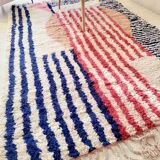 Béni Ouarain rug with stripes and geometric patterns