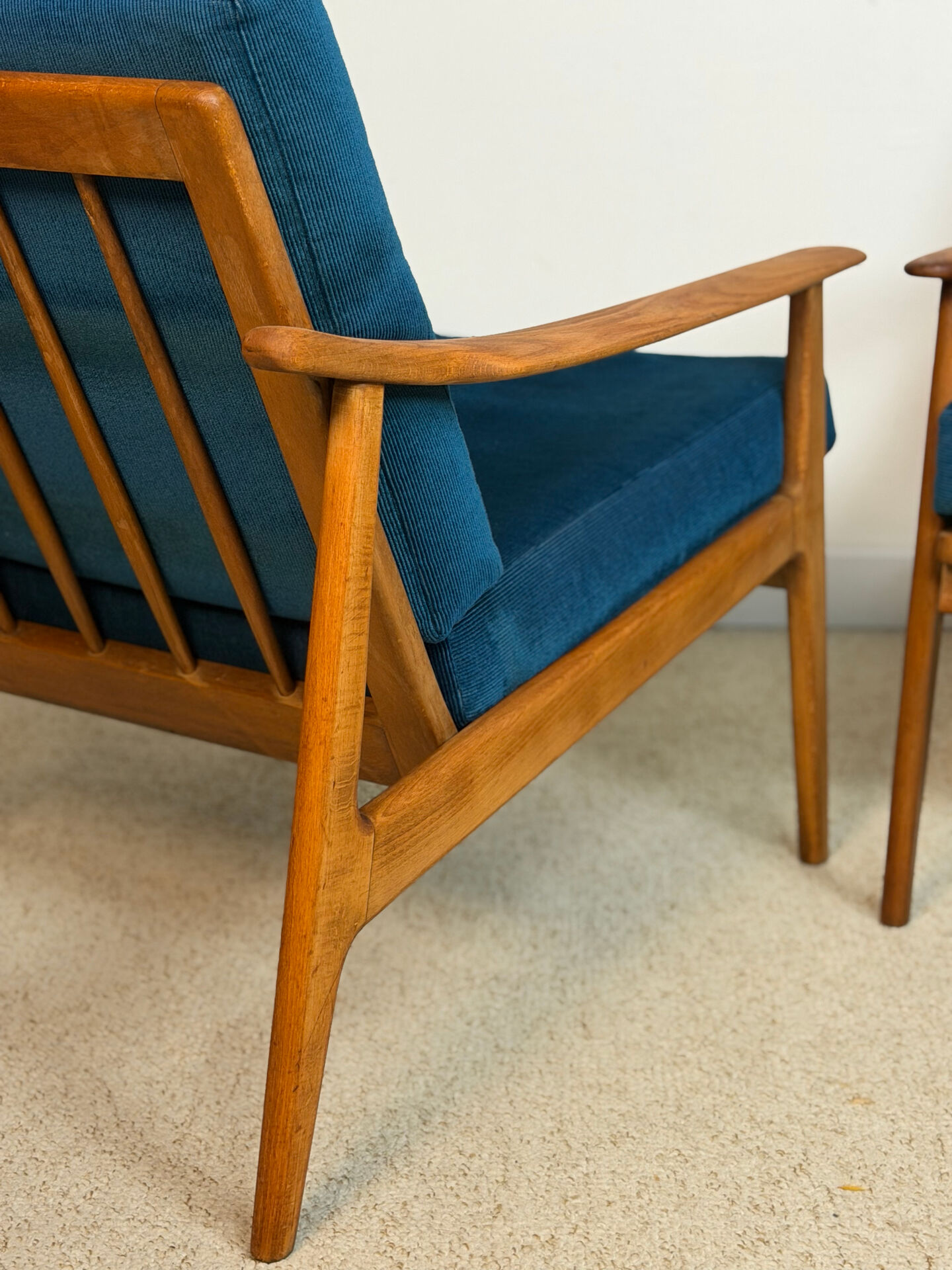 a pair of Scandinavian armchairs in teak from the 1960s