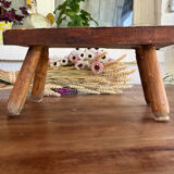 Low wooden stool