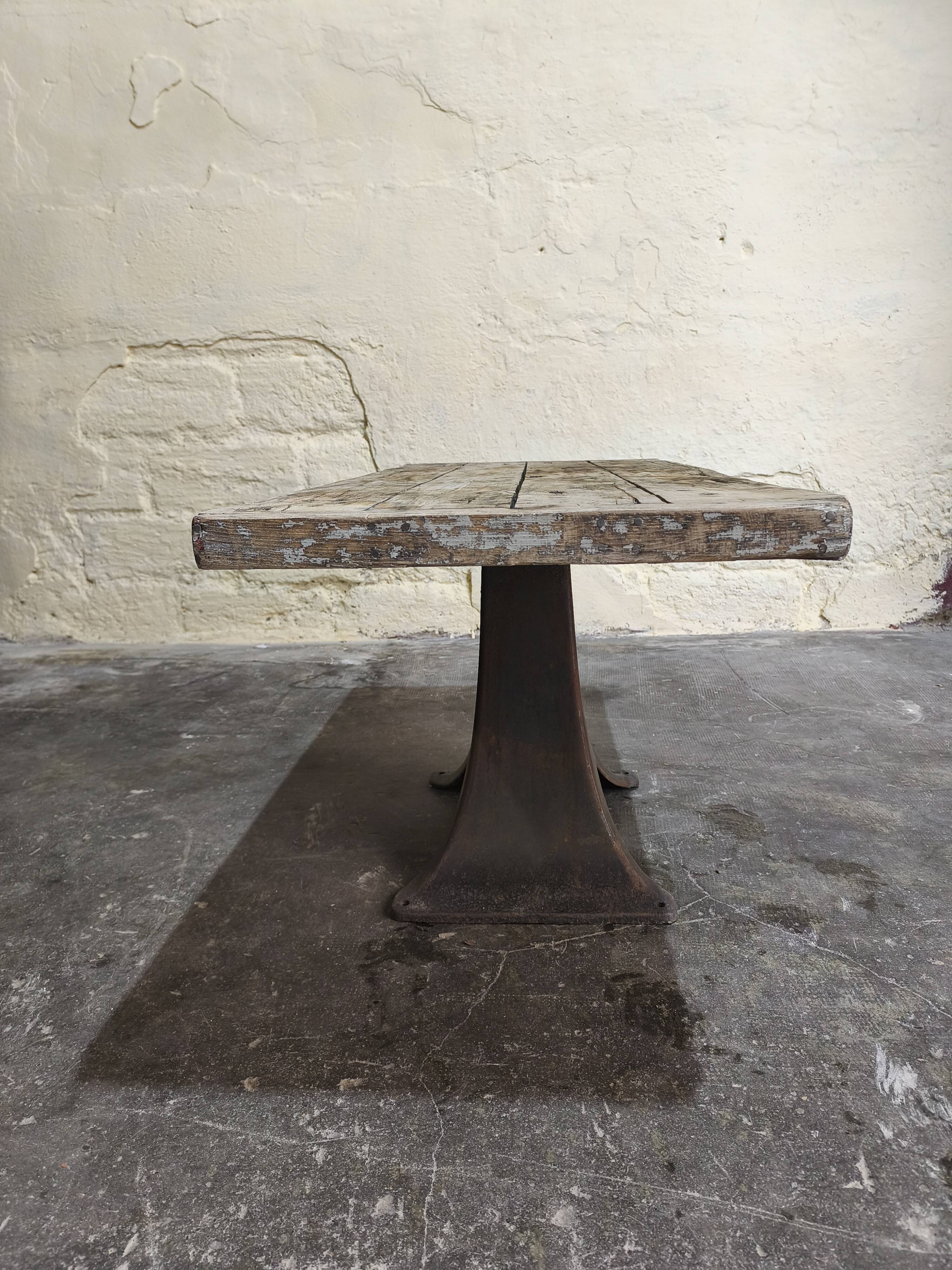 Solid oak coffee table with industrial cast iron legs