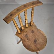 Old farmers tripod chair for decorative use