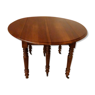 Table ronde extensible en noyer 6 pieds