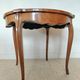 Flying table in Louis XV style with floral marquetry and bronze fittings.
