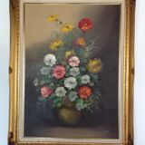 Tableau "fleurs" signé delreux