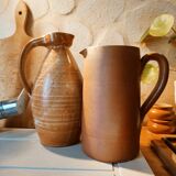 Duo of pitchers water, wine