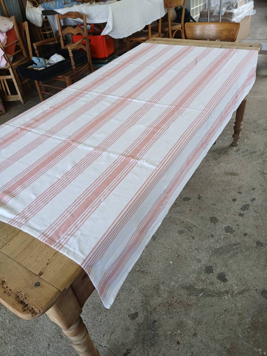 Old pink and white tablecloth