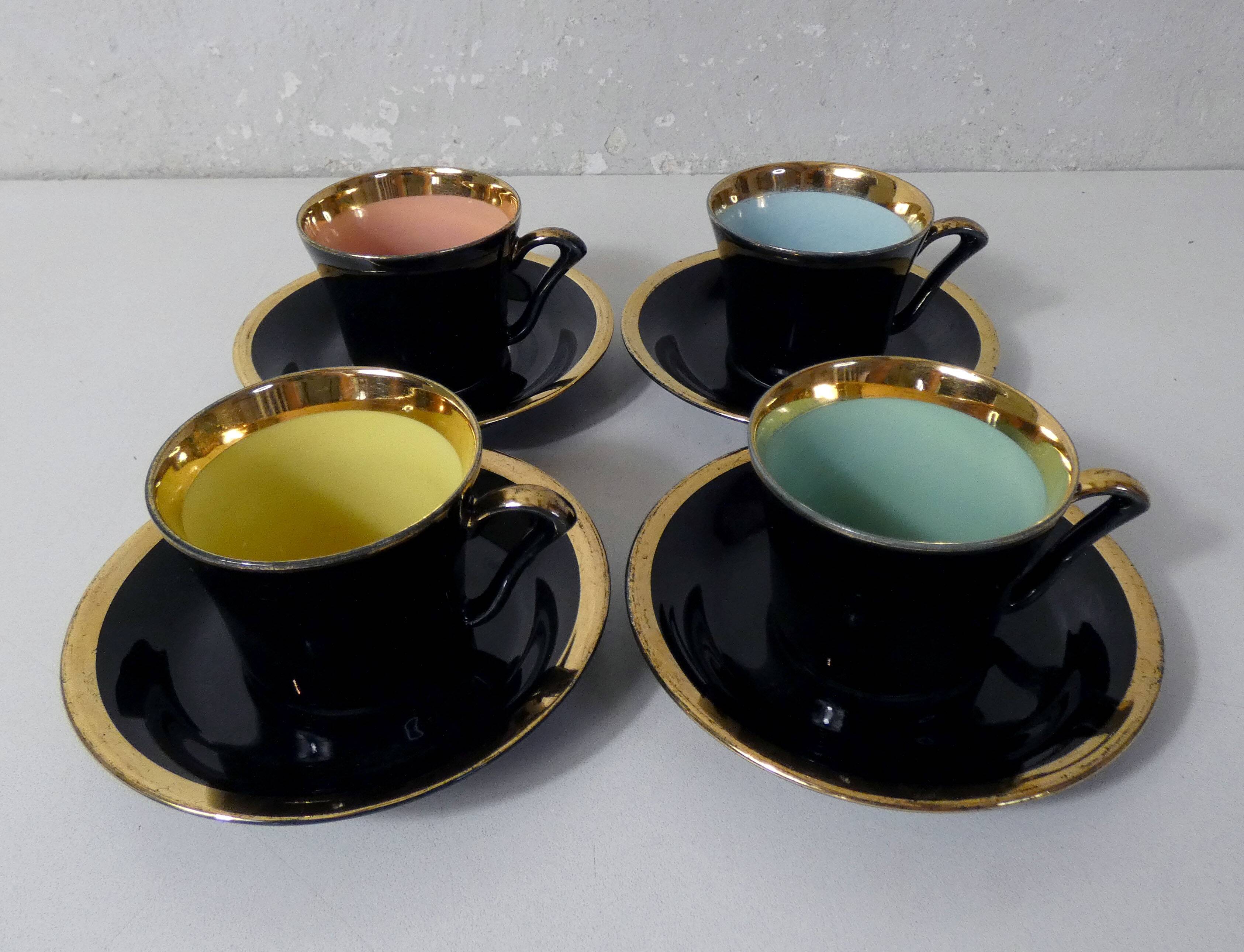 4 old black and gold cups in Vintage color