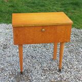 Vintage 1950s bedside table in blond oak with conical legs