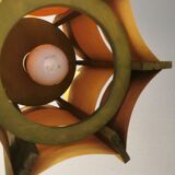 Older lamp in wood veneer, partially painted in green colour.