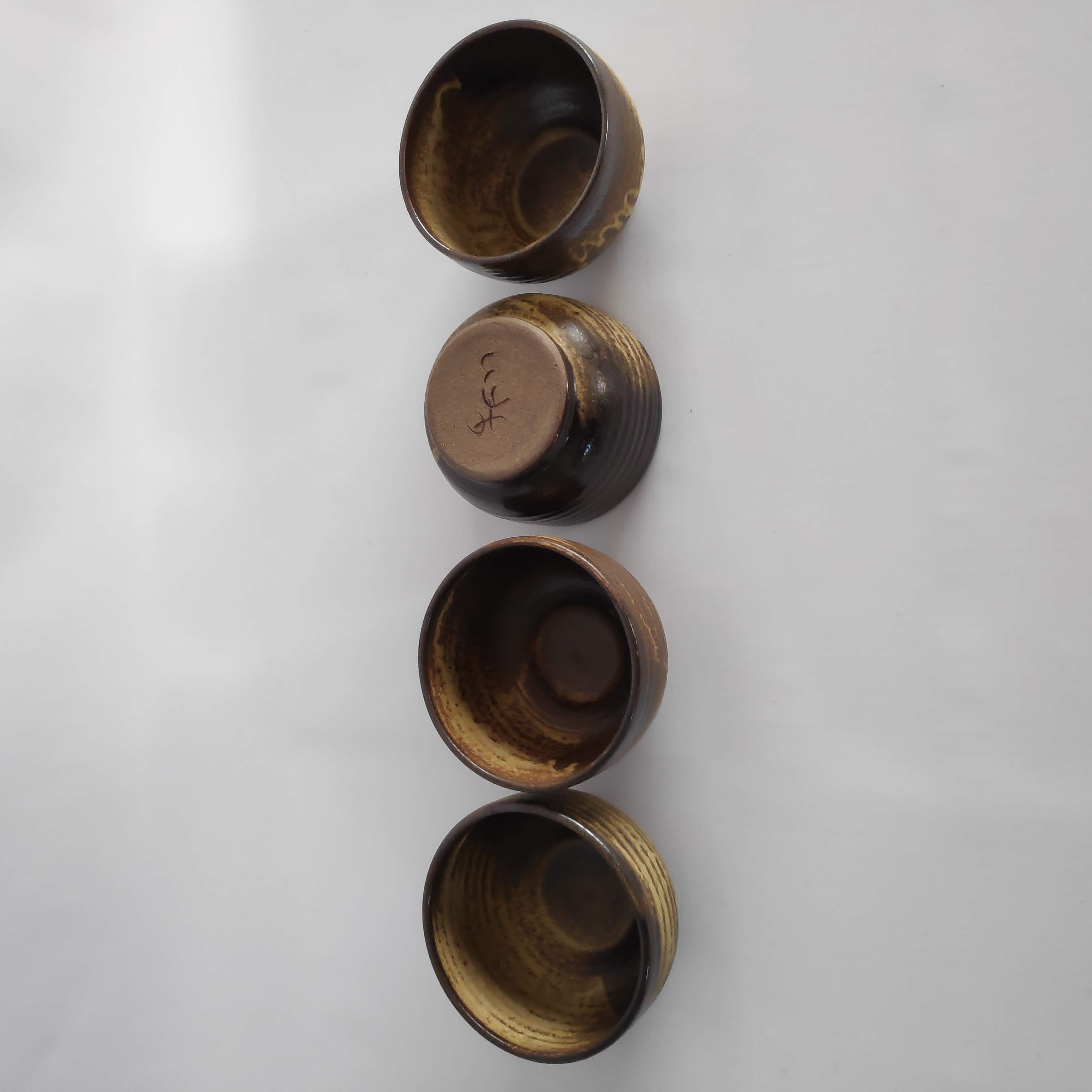 4 bowls in Brown sandstone of the years 70