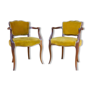 Paire de fauteuils en velours moutarde