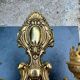 Wall light with 2 branches in baroque brass lion design.