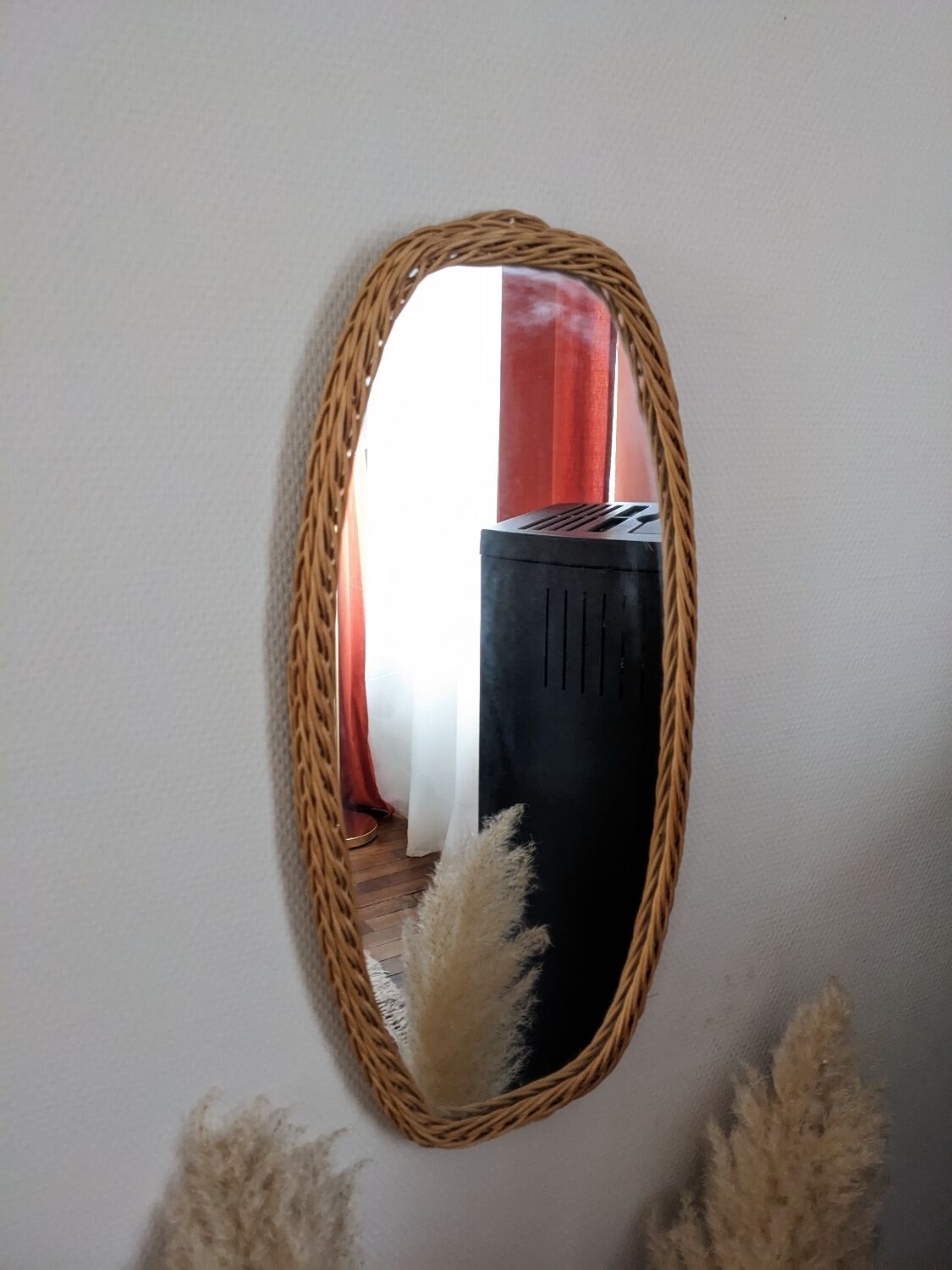 Vintage oval rattan mirror