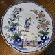 Ceramic dish with Chinese decorations