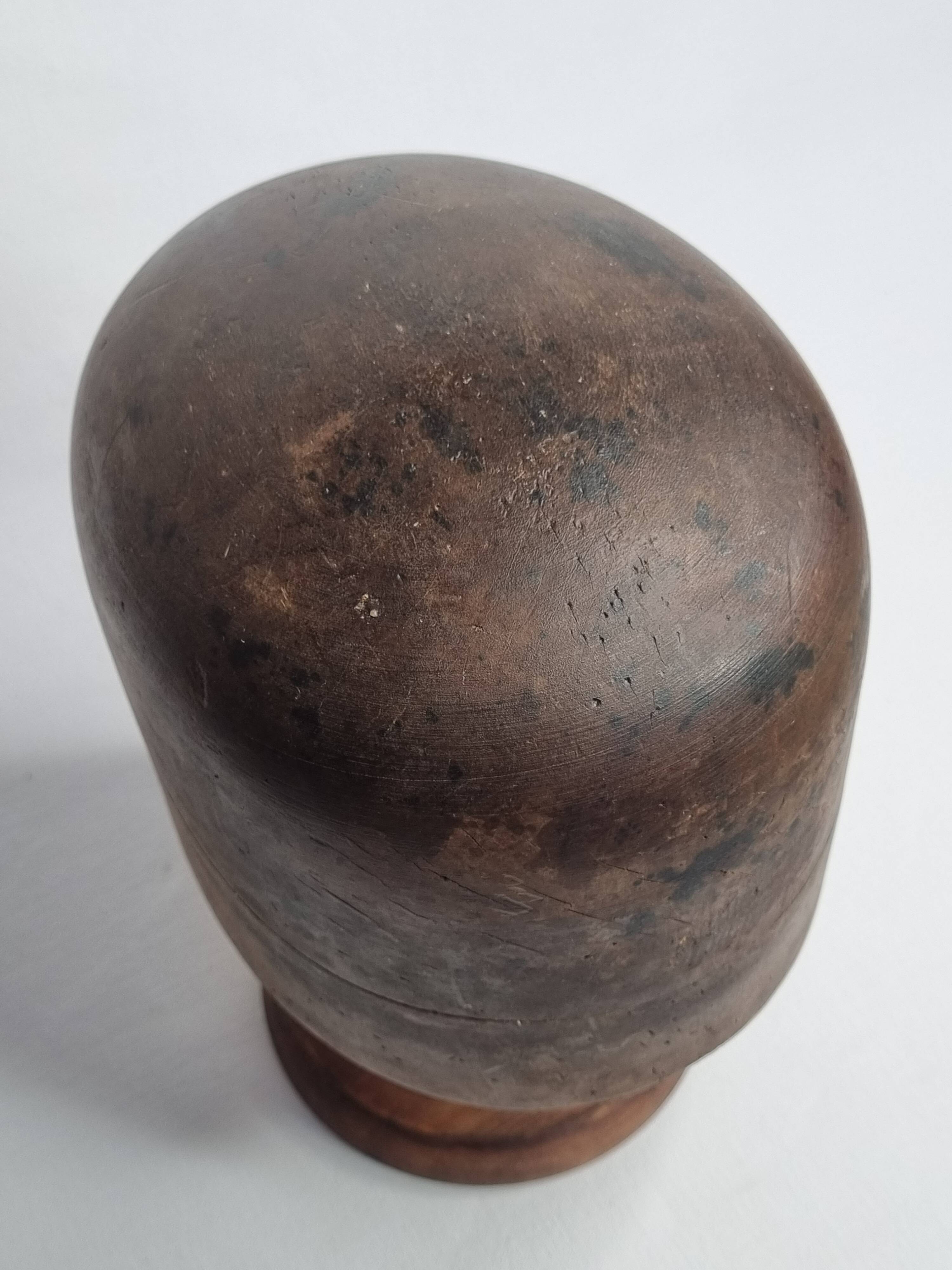 Standing wooden hat shape, 1900