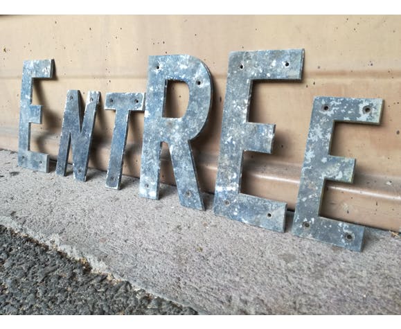 Entry into letters metal vintage