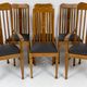 Set of 6 Art Nouveau chairs and armchairs in oak and leather.