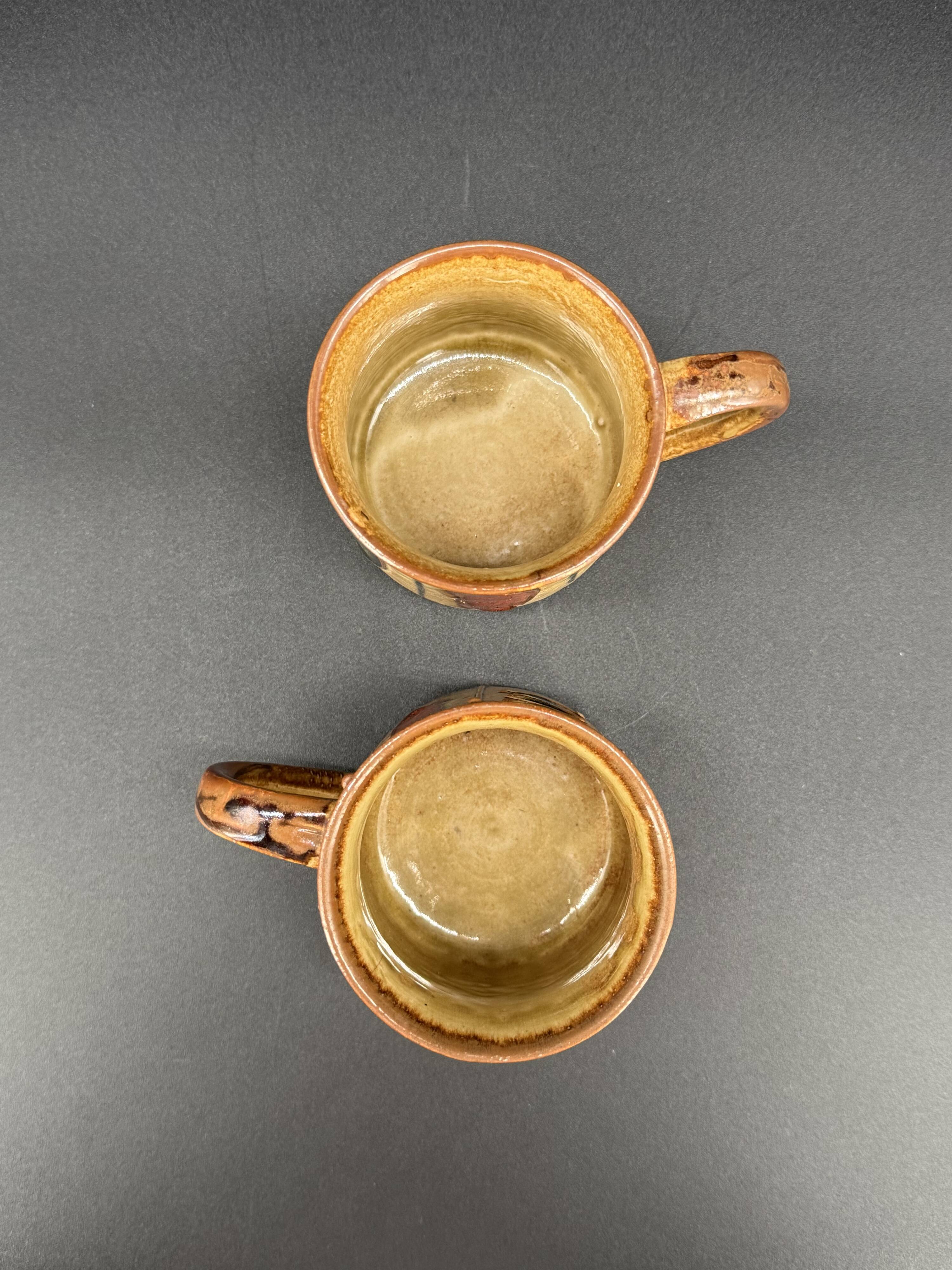 Pair of glazed stoneware mugs — abstract decor from the 70s