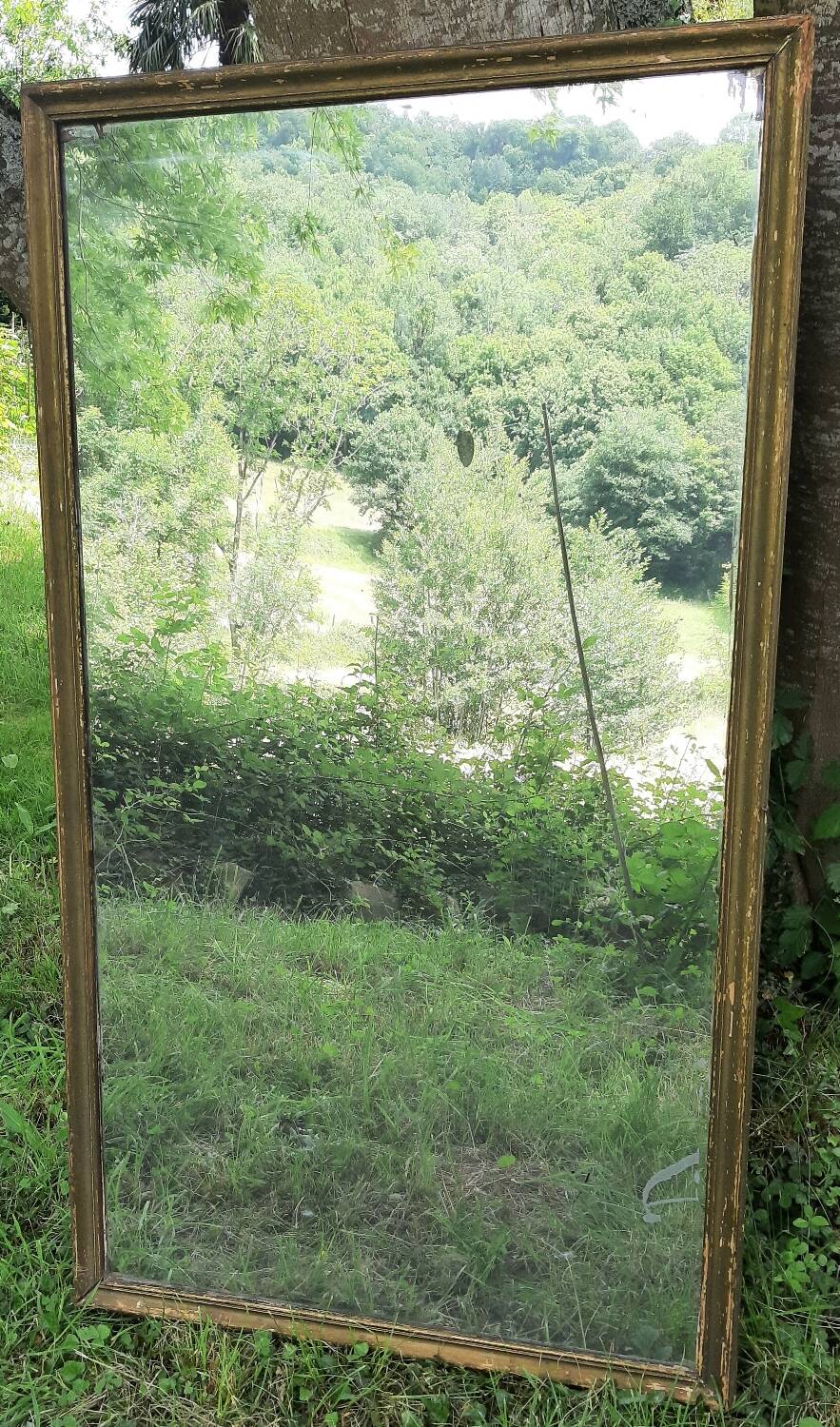 Antique mercury mirror. (Fireplace mirror)