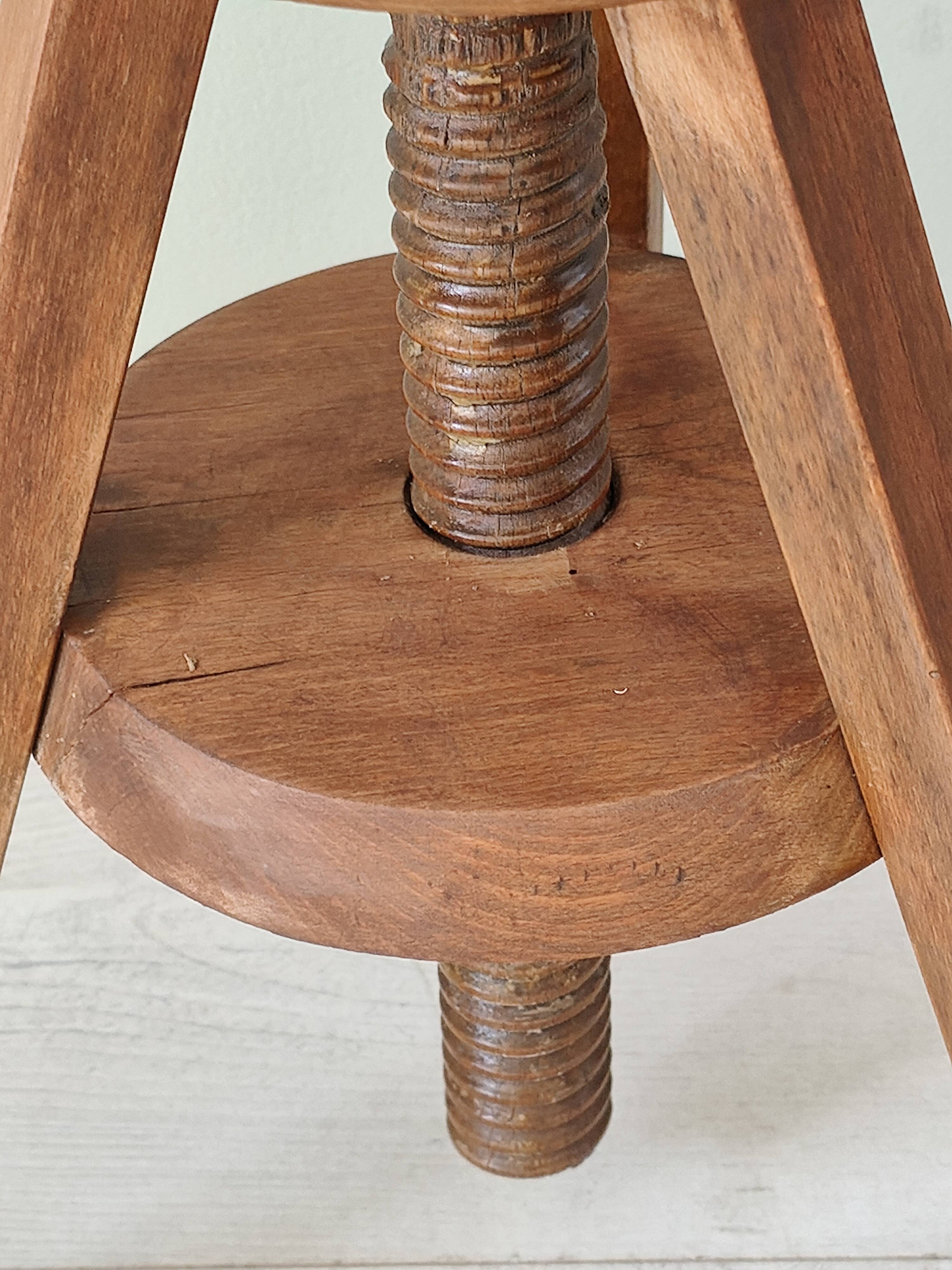 Adjustable vintage workshop stool made of solid wood