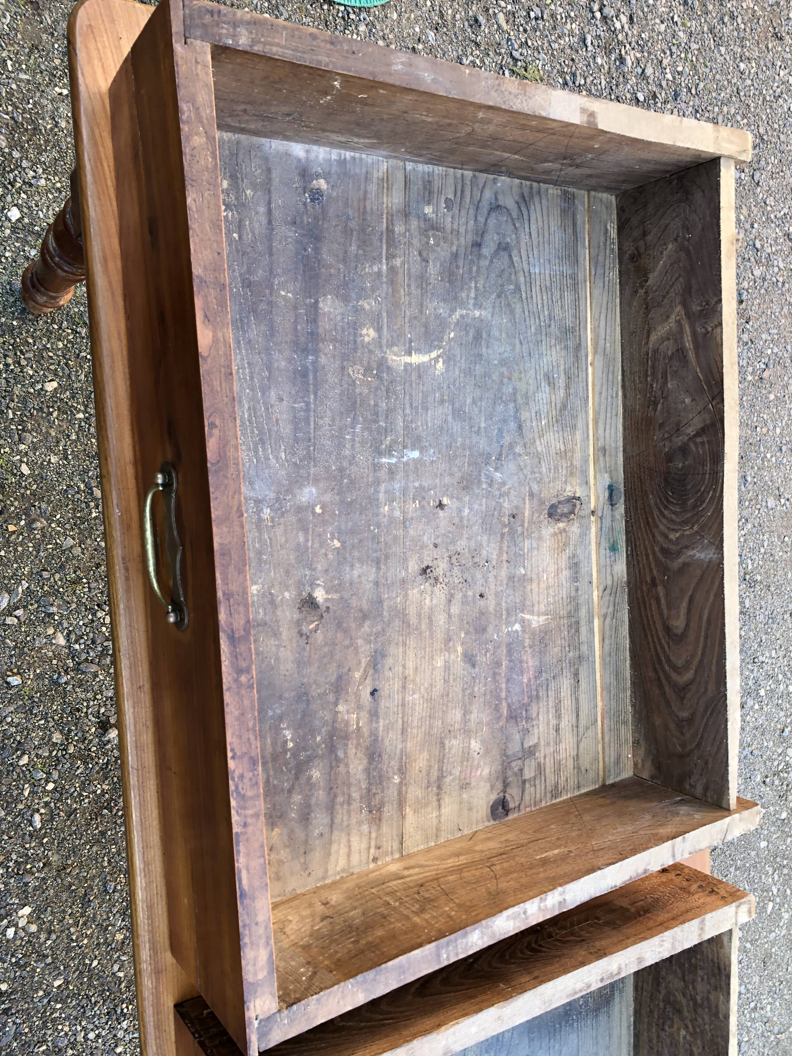 Antique cherry farmhouse table with turned legs and 2 drawers.