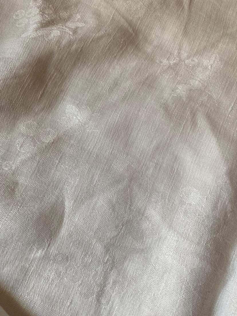 Old tablecloth in white cotton and monogram