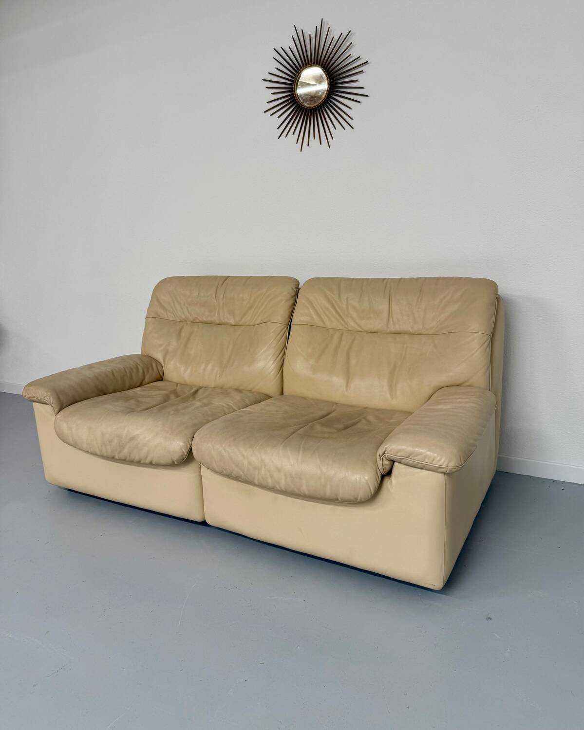 Old 2-seater beige leather sofa designed by Carl Larsson De Sede, vintage 80s