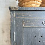 Old wooden locker with black patina