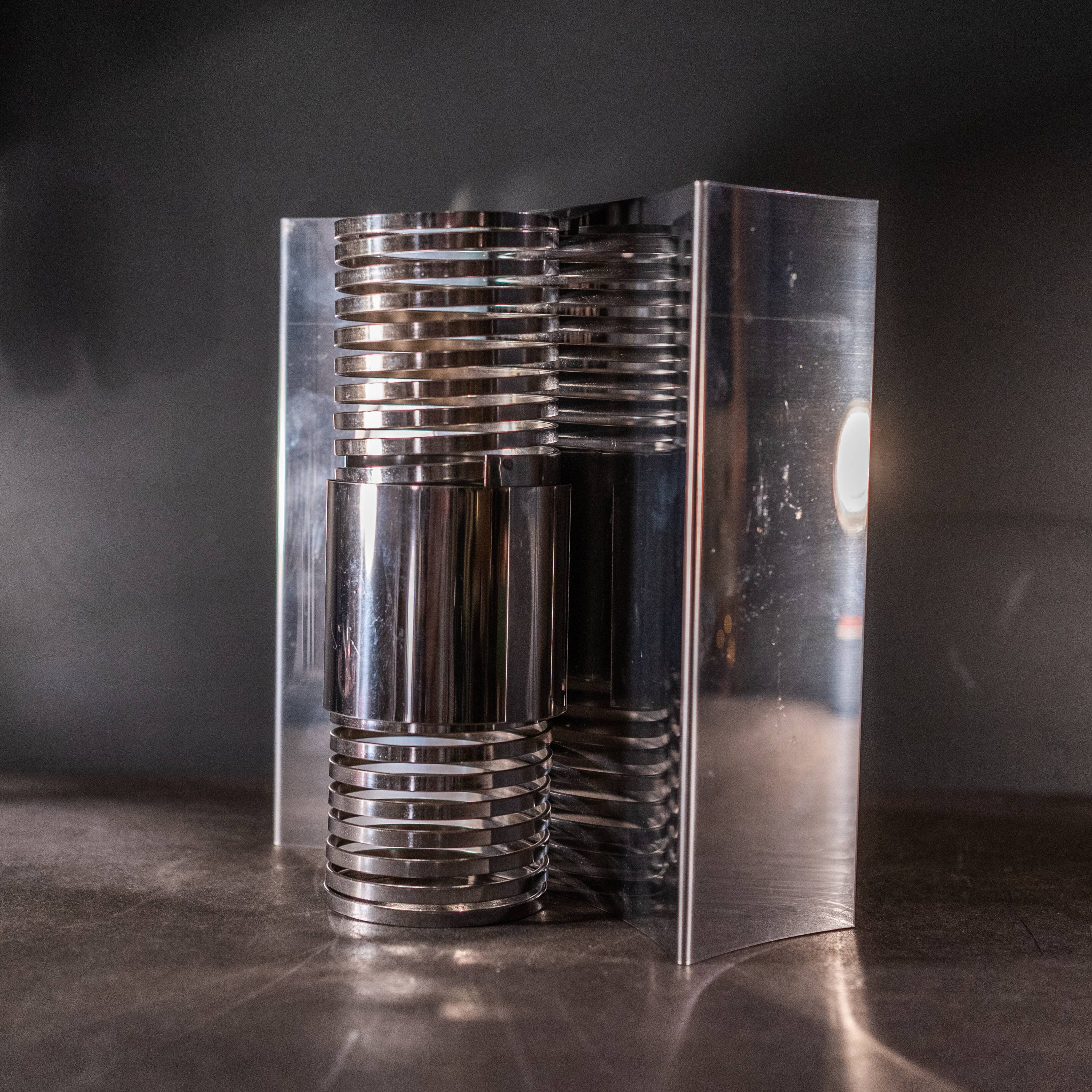 Pair of 'Spiral / Spring' wall lights in chromed steel, Space Age ca 1970