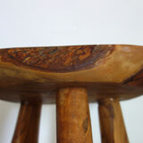 Brutalist stool made of olive wood