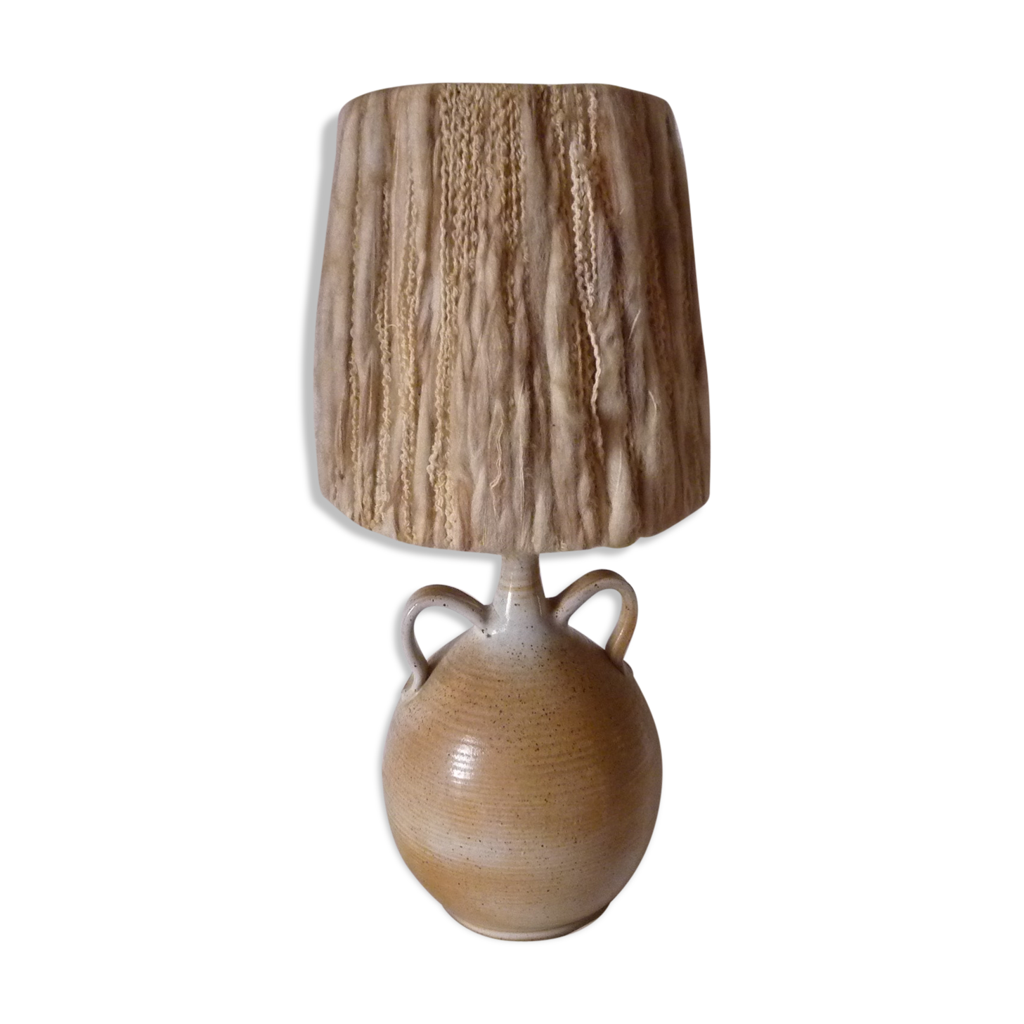 Lamp with sandstone handles