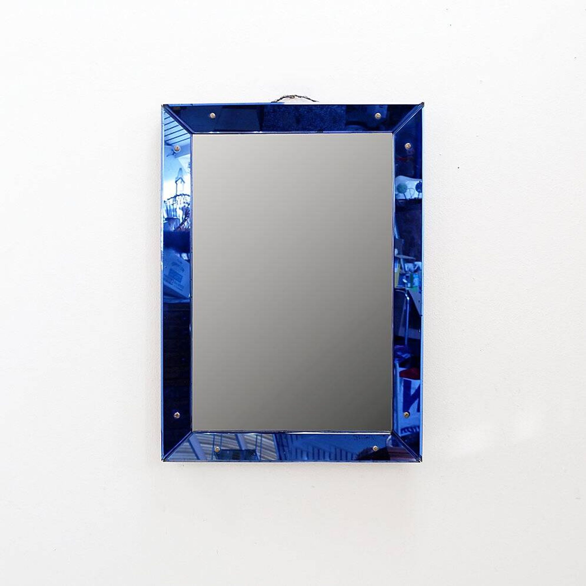 Mirror with coloured glass frame, Italy, circa 1950.