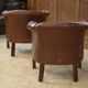 Paire de fauteuils Club capitonnés en cuir