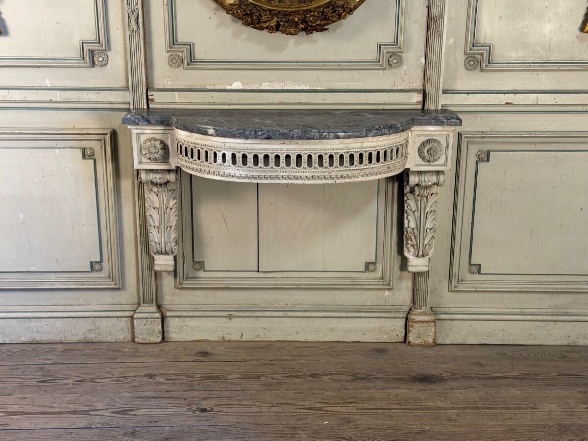 Louis XVI wall console in carved wood, grey patina, 18th century.