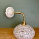 Vintage glass wall lamp with a white Clichy shade.