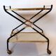 Rolling bar in gilded brass and black metal, Italy circa 1950
