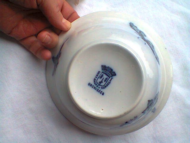 Ramekin in earthenware with decoration of flowers, butterflies and birds