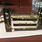 Knife holders in bakelite and gold leaf