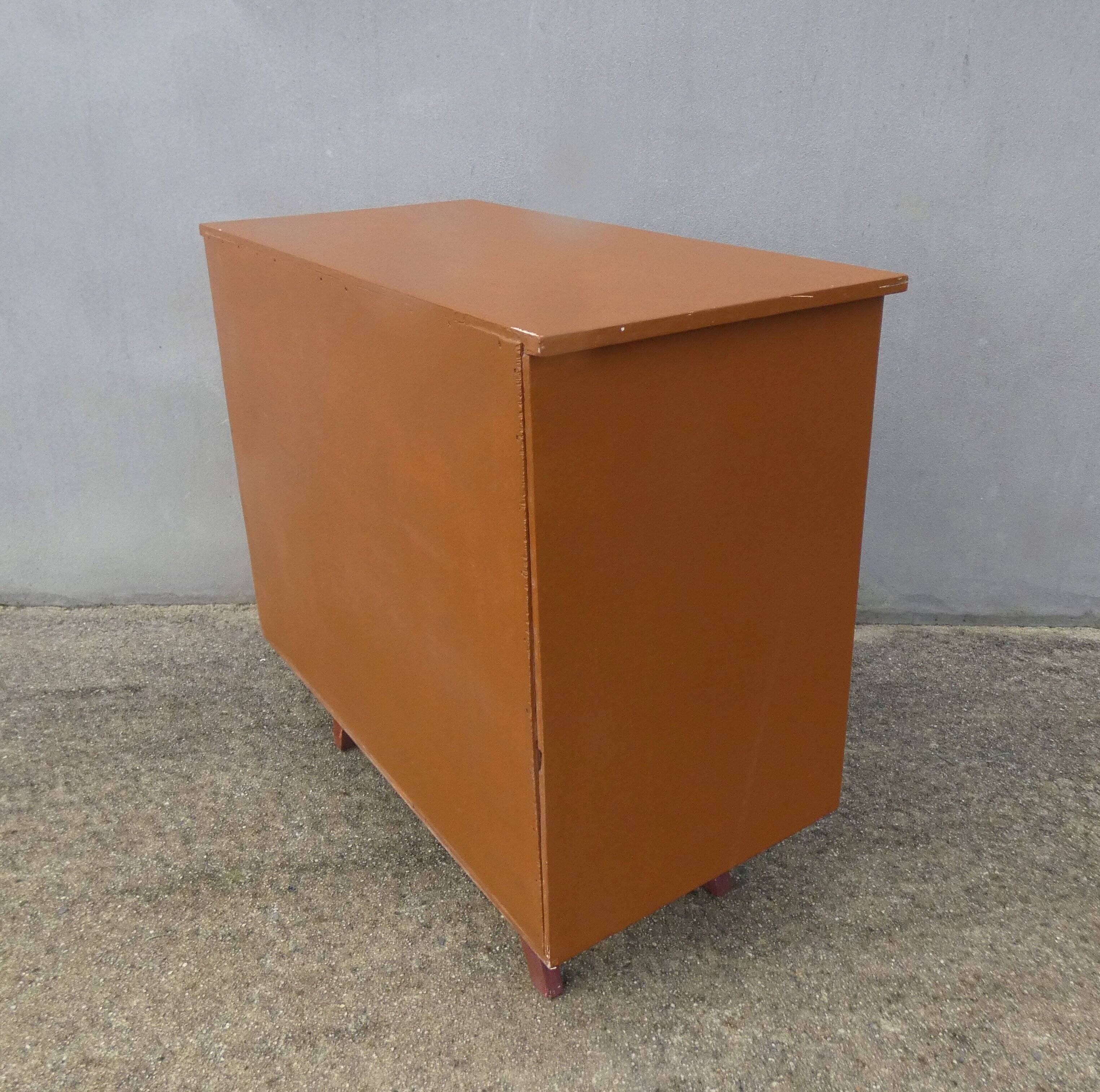 vintage wooden chest of drawers with tapered legs