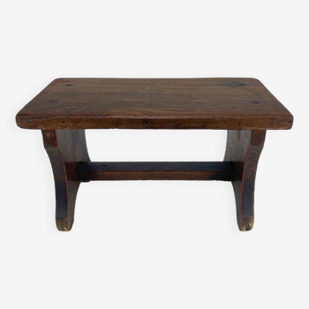 Small old wooden bench or footstool