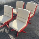 Set of 4 vintage 1970s swivel chairs in red and beige.