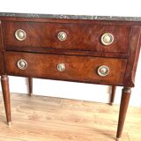 Louis XVI style wooden veneered chest of drawers with a marble top.