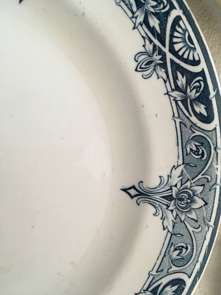 Together seven dessert plates mismatched in blue.