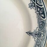 Together seven dessert plates mismatched in blue.