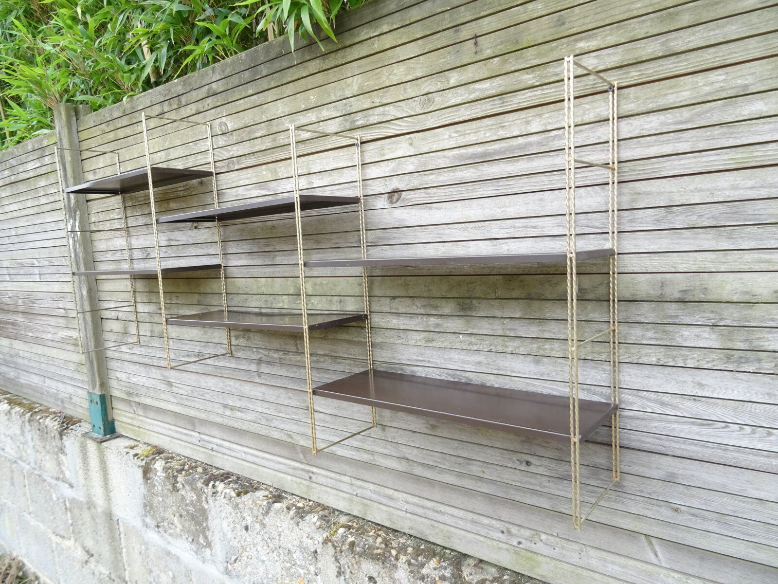 Modular metal string wall shelf