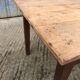 Rustic antique farmhouse table in solid cherry wood.